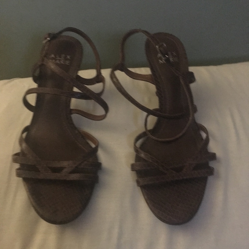 Brown “snakeskin “ kitten heel.